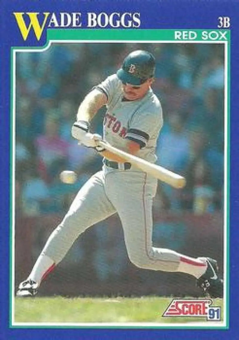 Wade Boggs swinging bat in gray away uniform on 1991 Score Boston Red Sox card