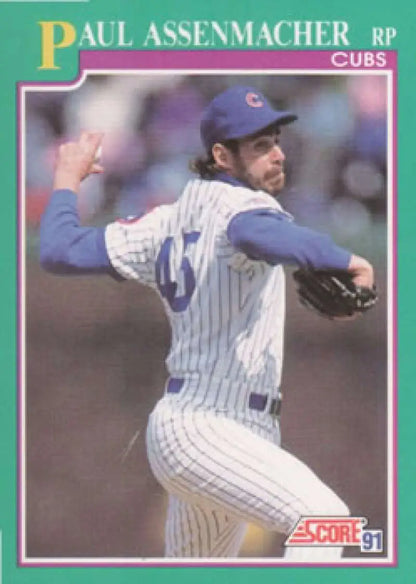 Paul Assenmacher mid-throw in white pinstriped uniform Chicago Cubs Baseball Card