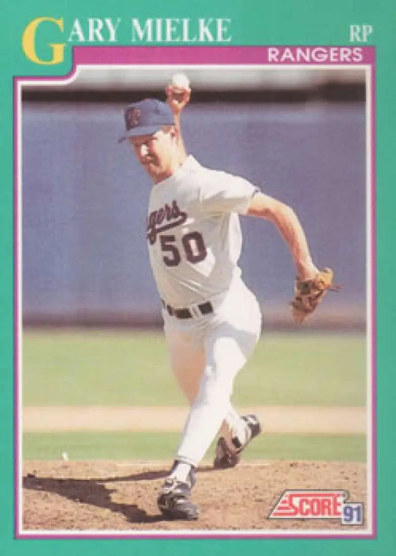 Baseball card of Gary Mielke, Texas Rangers pitcher, mid-delivery in white uniform