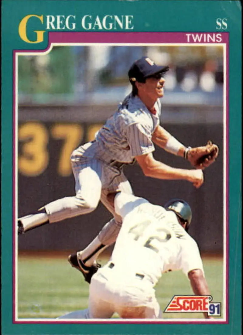 1991 Score #211 Greg Gagne baseball card featuring Minnesota Twins double play attempt