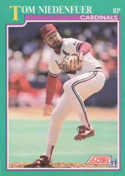 Baseball card of Tom Niedenfuer delivering a pitch for the Louis Cardinals