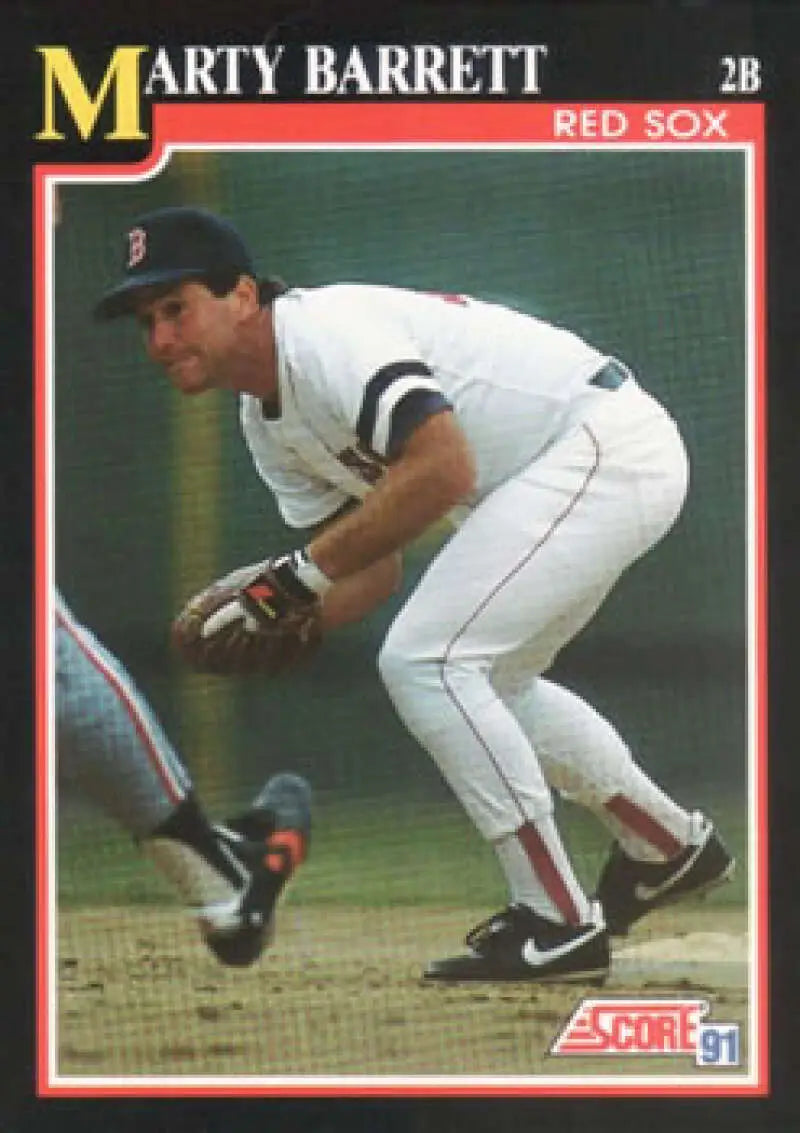 Baseball card of Marty Barrett in fielding stance for Boston Red Sox