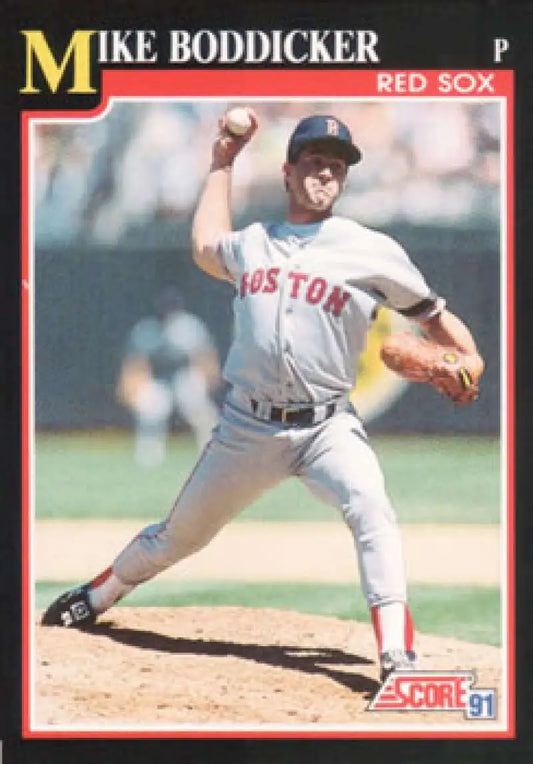 Baseball card of Mike Boddicker in mid-throw, representing the Boston Red Sox