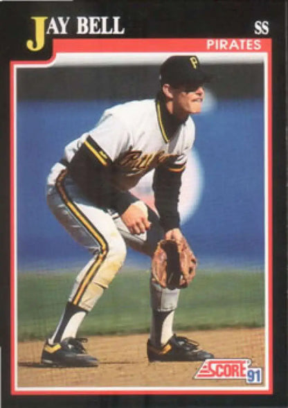 Jay Bell fielding in a white Pittsburgh Pirates uniform baseball card 1991 Score #323