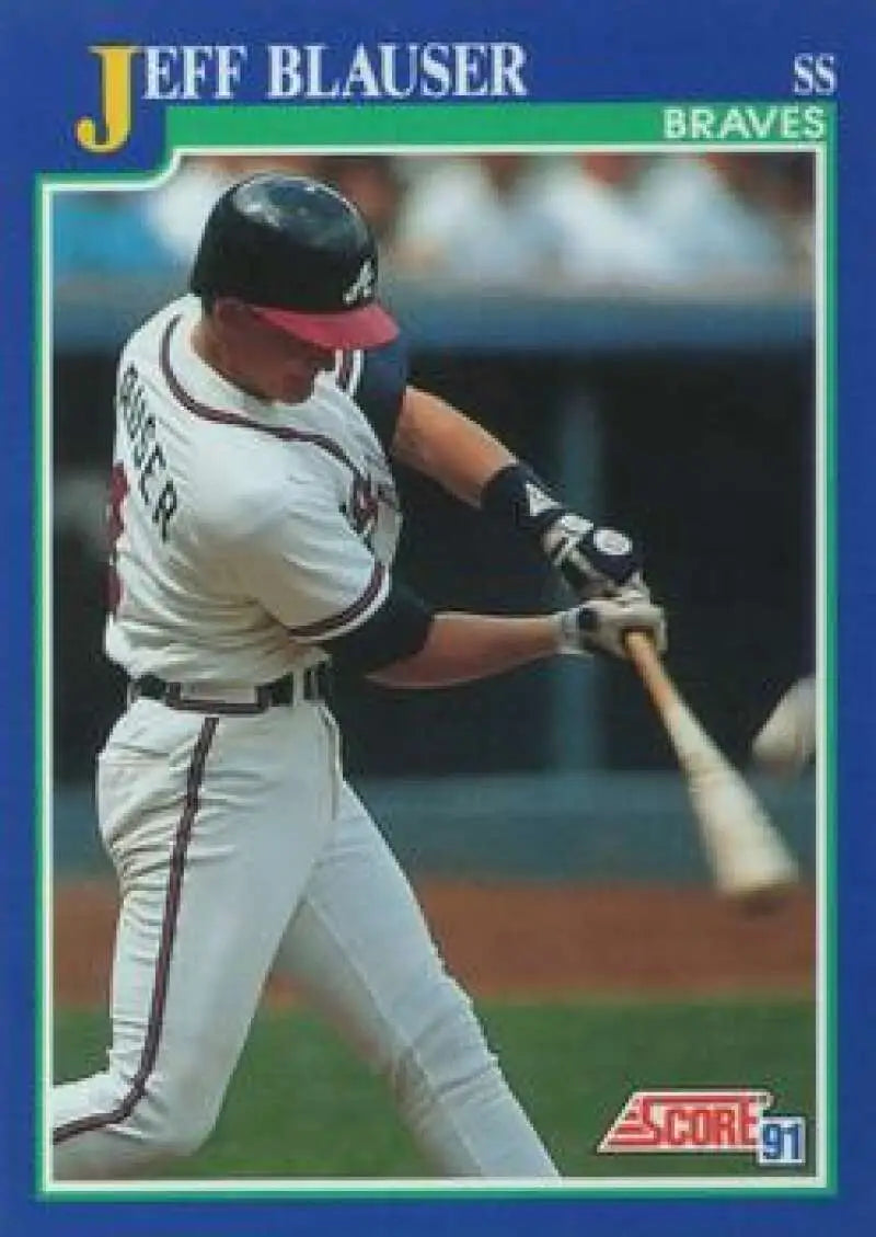 Atlanta Braves baseball card of Jeff Blauser mid-swing in a white uniform