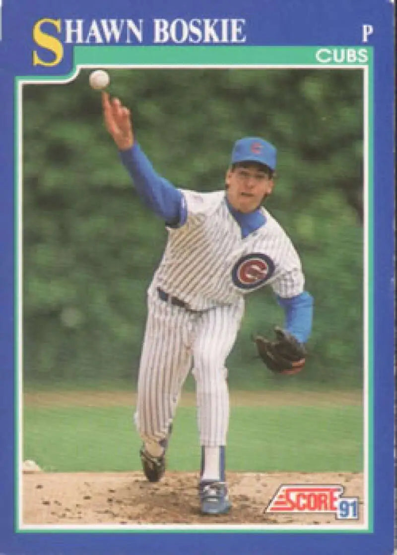 Shawn Boskie mid-throw in pinstriped home uniform Chicago Cubs baseball card