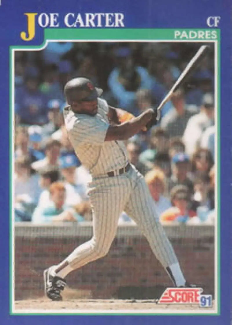 Baseball card of Joe Carter mid-swing in San Diego Padres pinstriped uniform