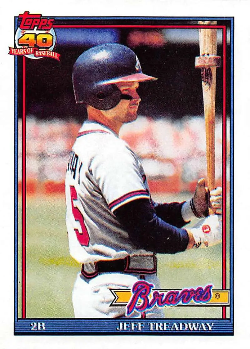 Atlanta Braves Baseball Card of Jeff Treadway at bat in white and navy uniform