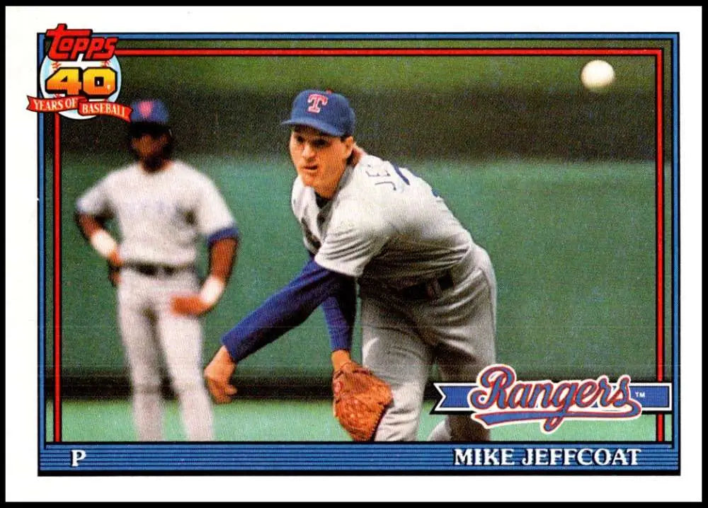 Mike Jeffcoat delivering pitch in white uniform on 1991 Texas Rangers baseball card