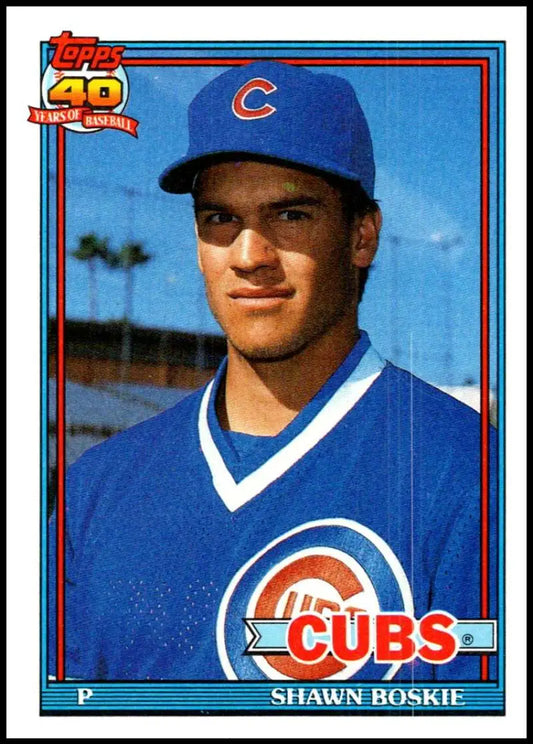 1991 Topps baseball card of Shawn Boskie, Chicago Cubs pitcher in blue uniform