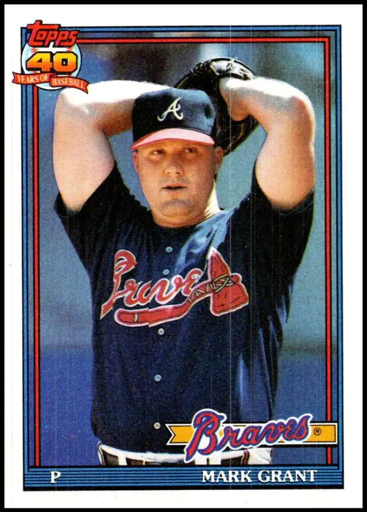 Atlanta Braves Mark Grant baseball card showing pitcher in windup motion