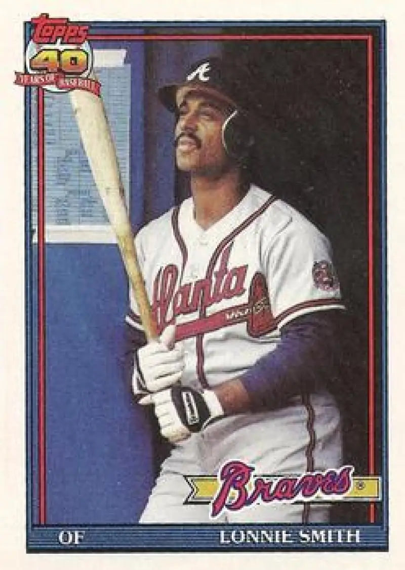 Lonnie Smith Atlanta Braves baseball card in white uniform holding bat