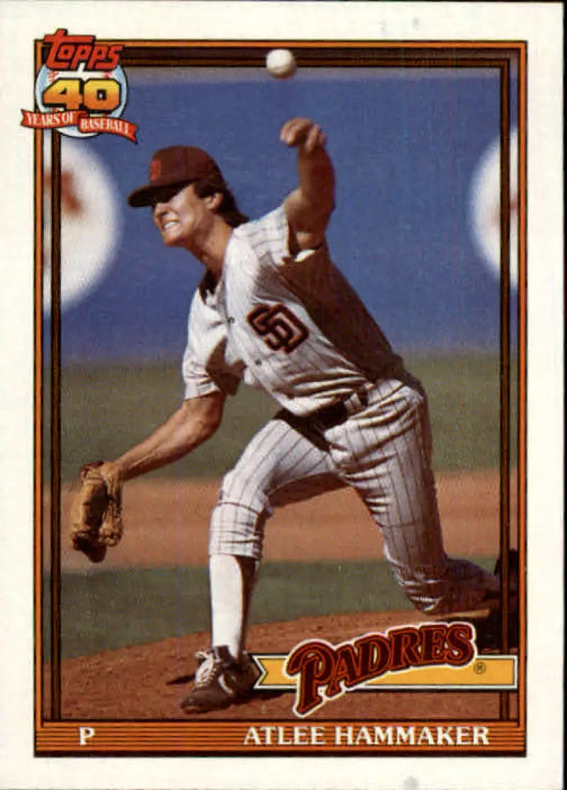 Baseball card of Atlee Hammaker in mid-throw wearing San Diego Padres pinstripes