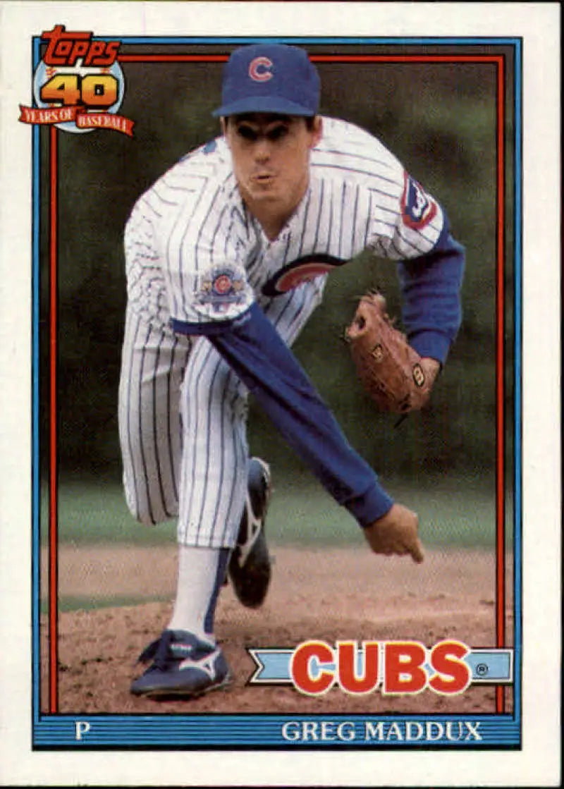 Greg Maddux pitching in Chicago Cubs pinstripes on 1991 Topps baseball card