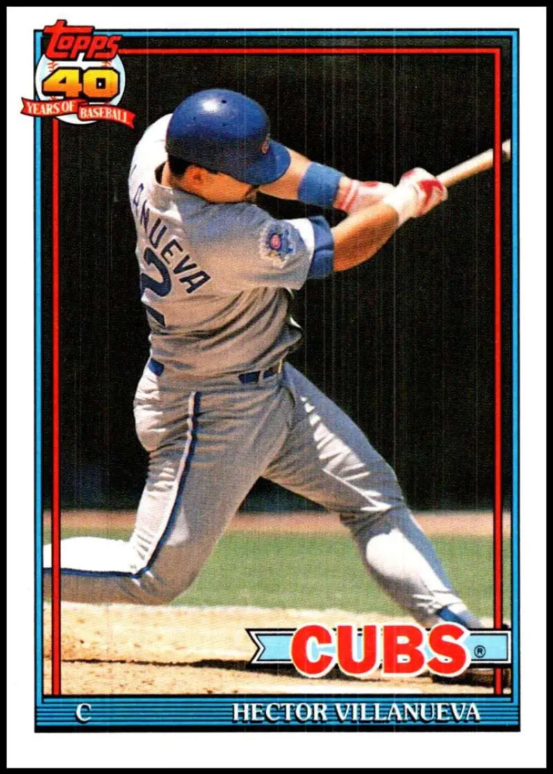 Hector Villanueva mid-swing in gray Chicago Cubs baseball uniform on card