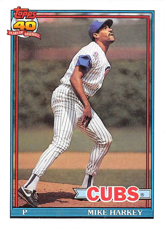 Chicago Cubs baseball card of Mike Harkey in a white pinstriped uniform mid-delivery