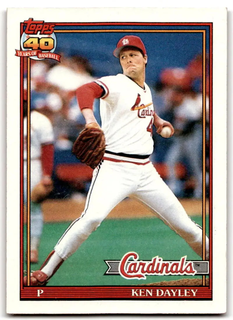 Topps baseball card of Ken Dayley pitching for the St. Louis Cardinals in white uniform