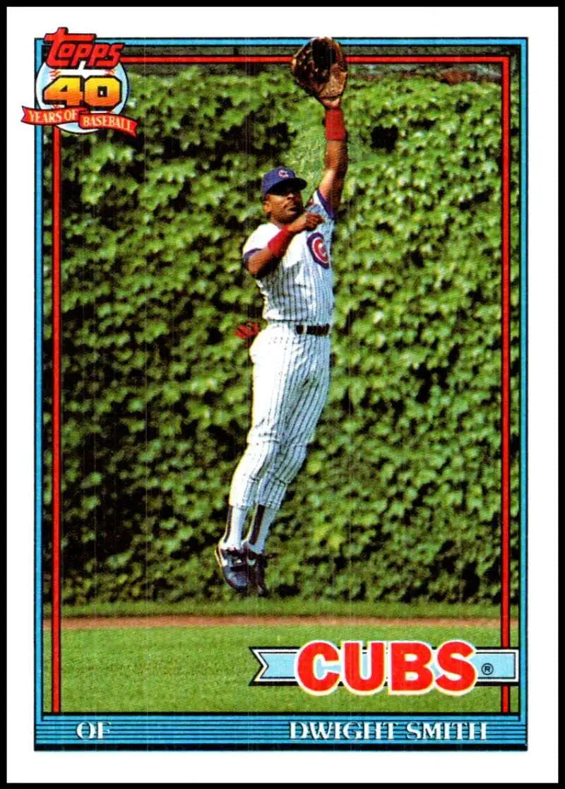 Dwight Smith leaps at the ivy wall on this Chicago Cubs baseball card from 1991