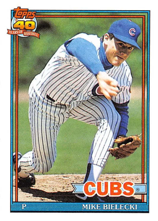 Baseball card of Mike Bielecki delivering pitch for Chicago Cubs in pinstriped uniform