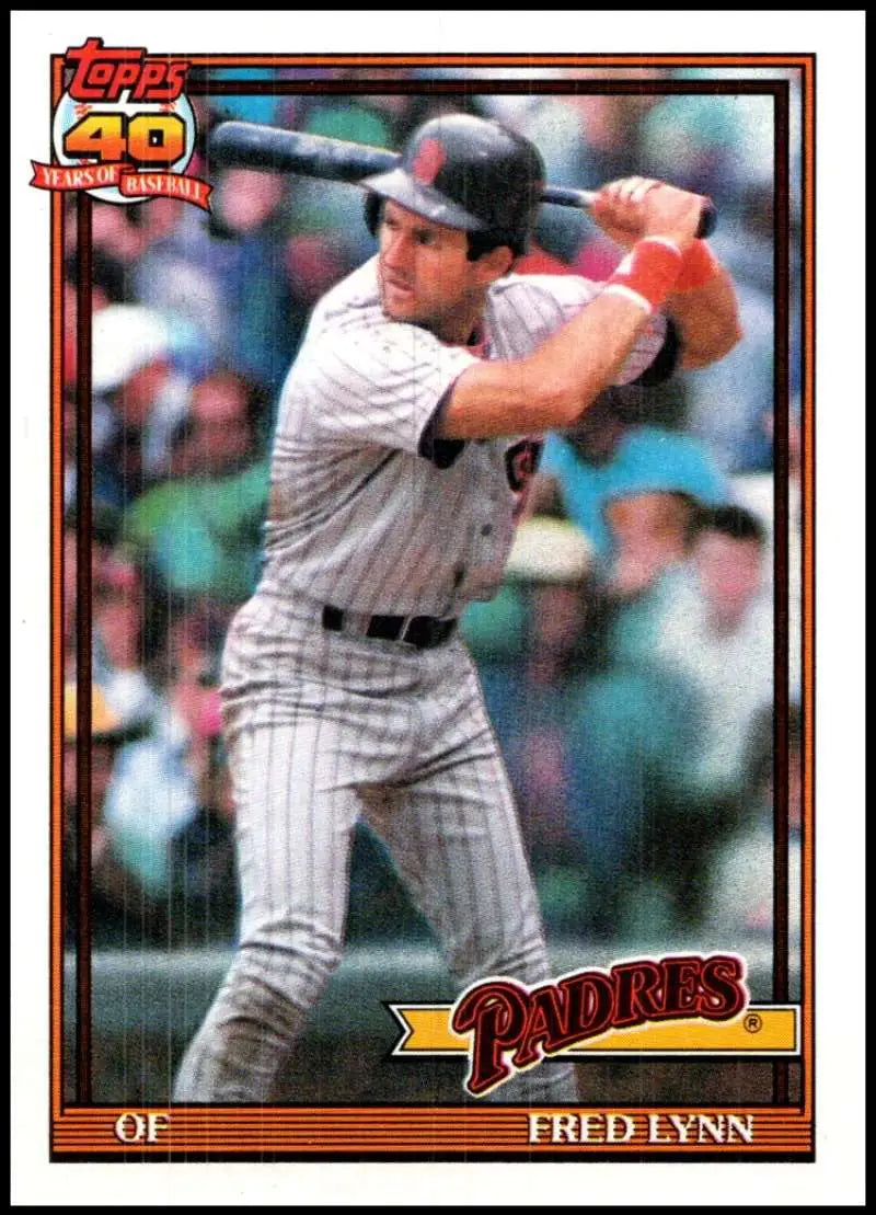 Baseball card of Fred Lynn batting for the San Diego Padres in pinstriped uniform