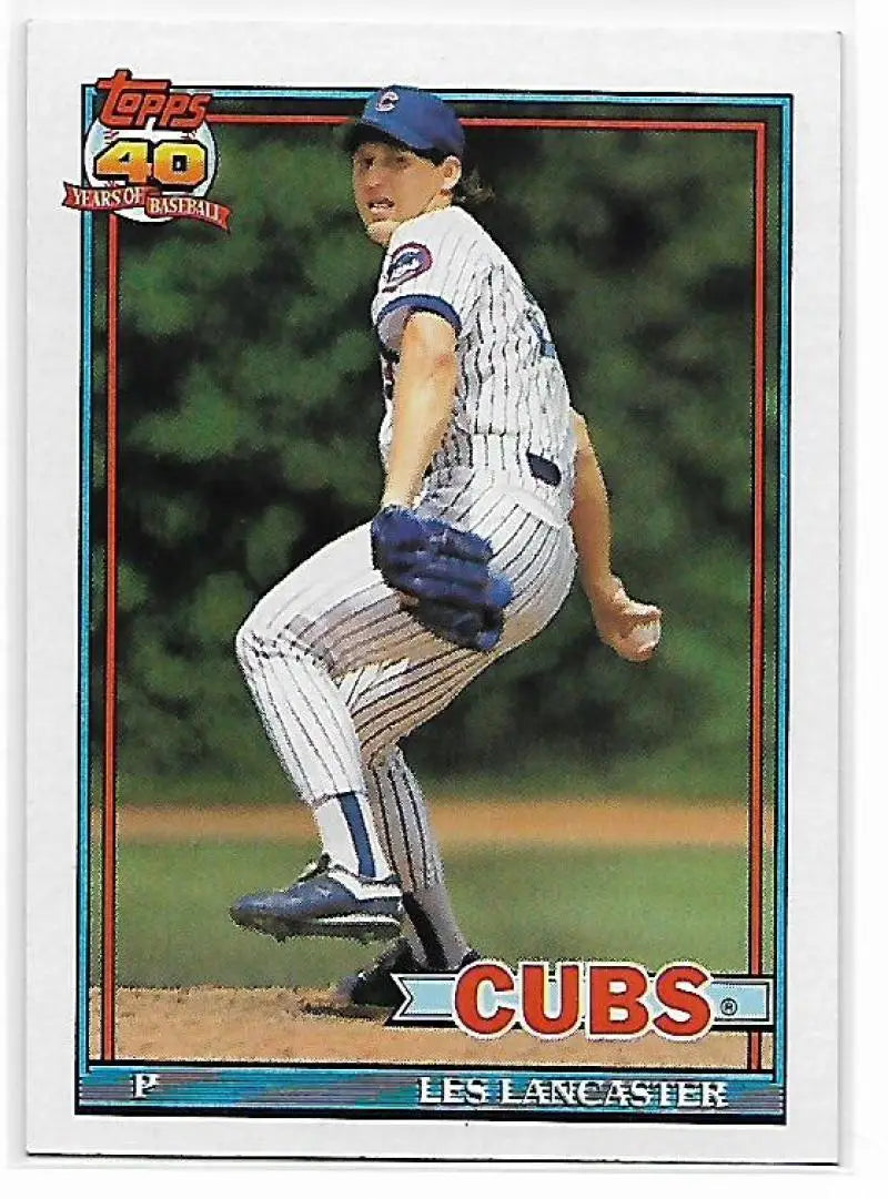 Chicago Cubs baseball card of Les Lancaster in white pinstriped uniform mid-delivery