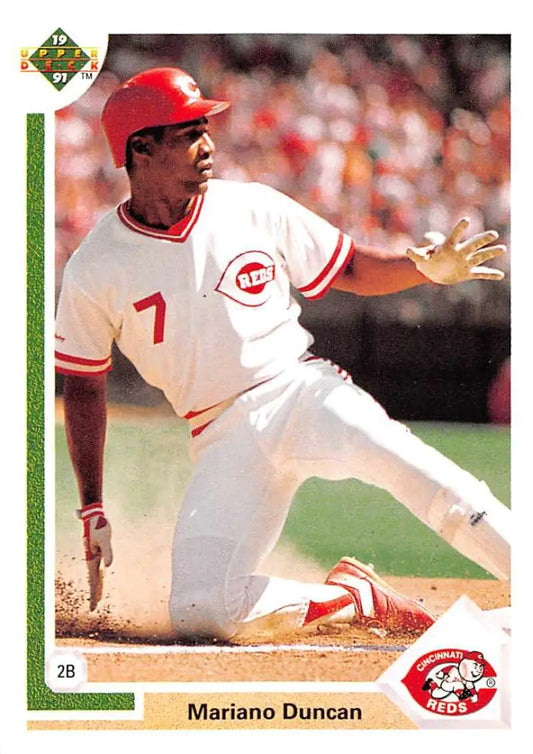 Cincinnati Reds player sliding into base, featured on 1991 Upper Deck Joe Girardi card