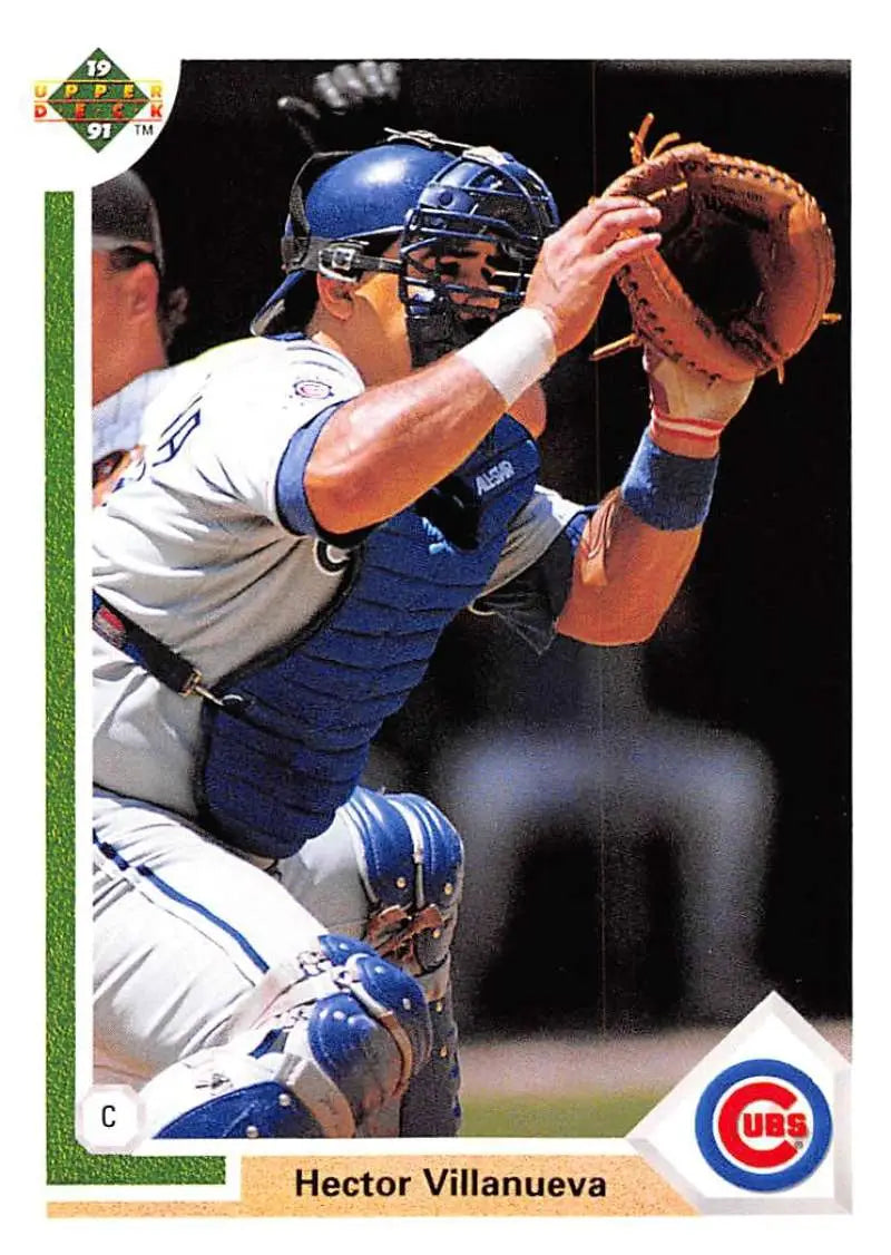 Hector Villanueva in a Chicago Cubs uniform catching with protective gear and mitt