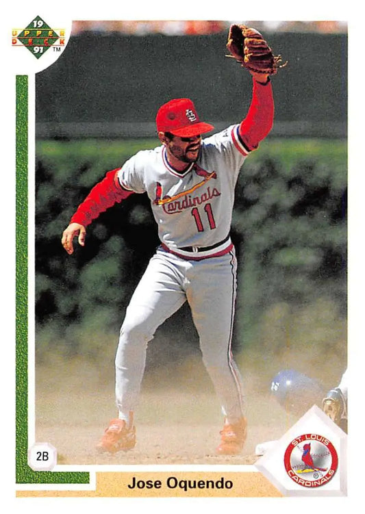 Jose Oquendo making a defensive play at second base on a 1991 Upper Deck baseball card