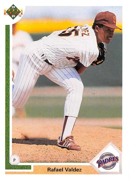 Baseball player in white pinstriped Padres uniform delivering pitch on baseball card