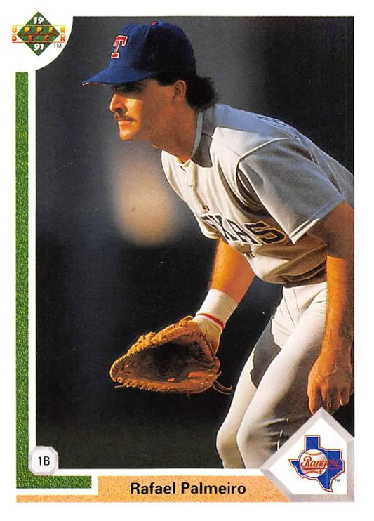 Baseball card of Rafael Palmeiro in Texas Rangers uniform with glove displayed