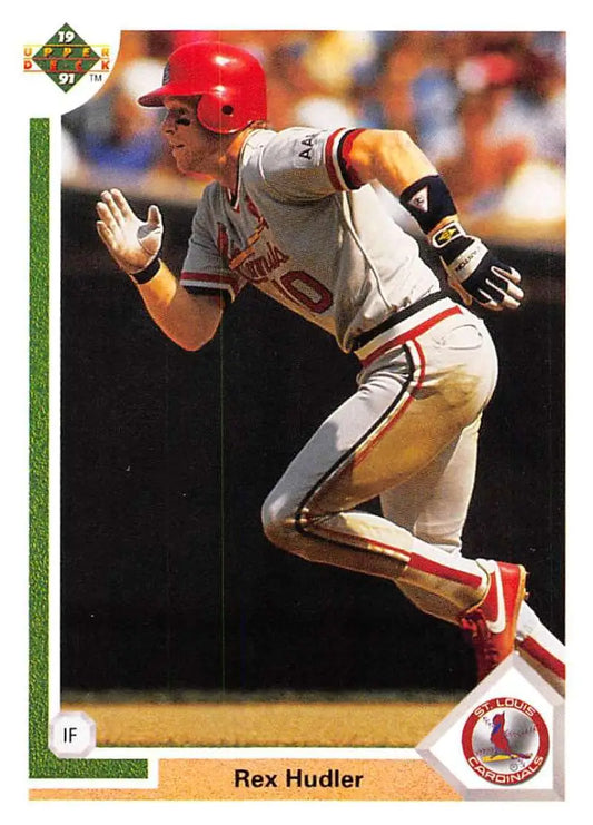 Rex Hudler swinging a bat in California Angels uniform on Upper Deck baseball card