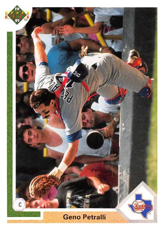 Texas Rangers player Geno Petralli making a spectacular catch near the dugout