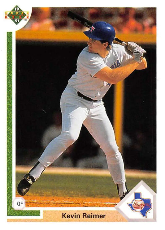 Baseball player Kevin Reimer in white uniform at bat for Texas Rangers Baseball Card