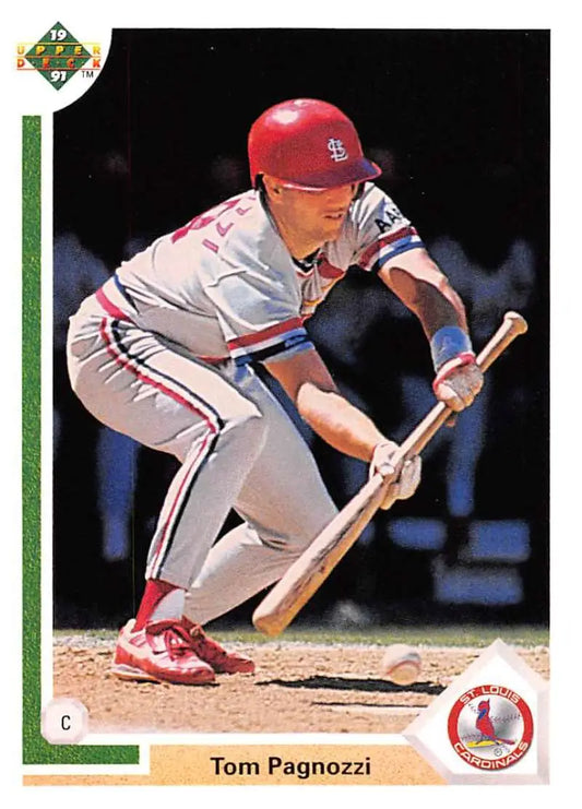 Baseball player in a Cardinals uniform bunting on Tom Pagnozzi’s Louis Cardinals card