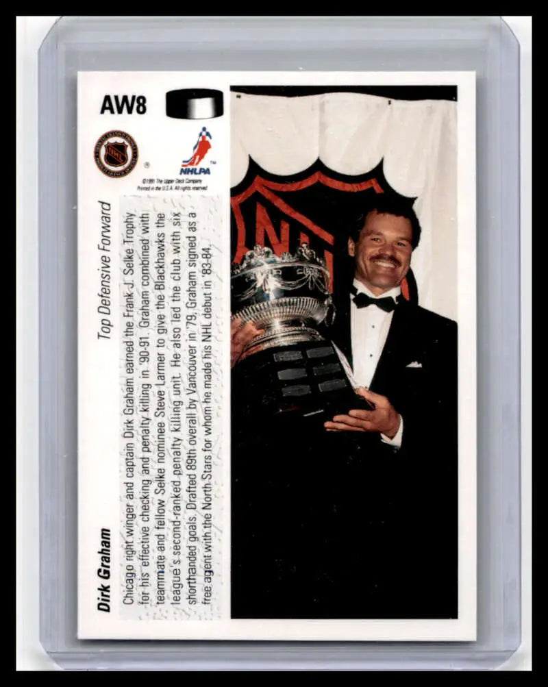 Dirk Graham in tuxedo holding trophy on 1991 Upper Deck Chicago Blackhawks card