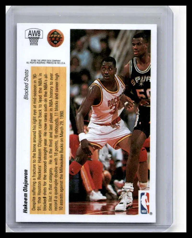 Basketball trading card featuring Hakeem Olajuwon from Houston Rockets and game action