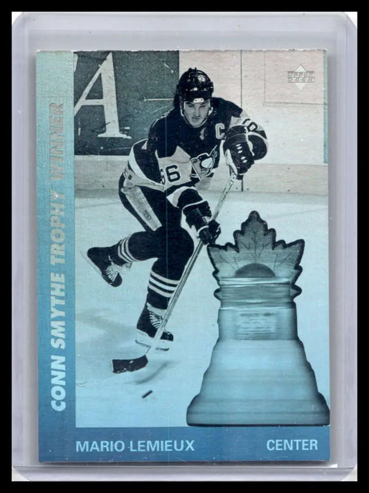 Hockey trading card of Mario Lemieux in dark uniform with chess piece design, Upper Deck AW9