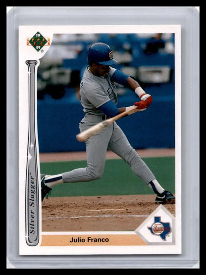 Julio Franco mid-swing in grey uniform on 1991 Texas Rangers Baseball Card