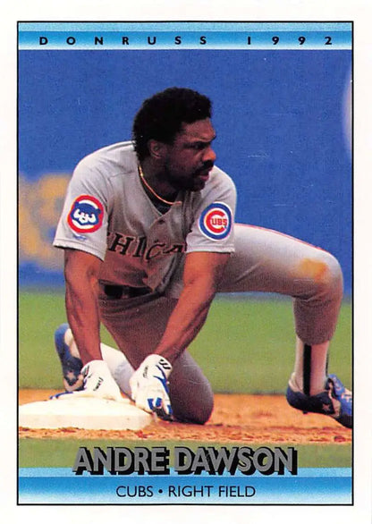 1992 Donruss #119 Andre Dawson baseball card showing a Chicago Cubs player sliding into base