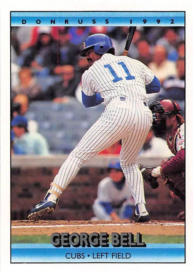 1992 Donruss George Bell Chicago Cubs baseball card with left fielder in pinstripes