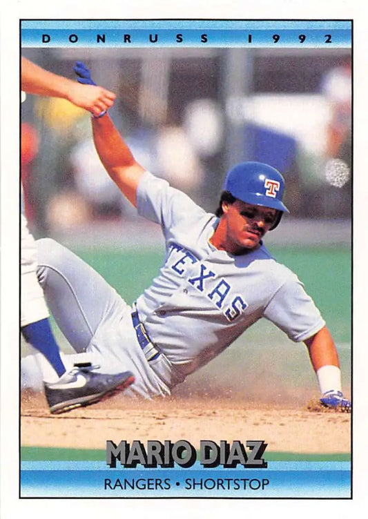 1992 Donruss #149 Mario Diaz sliding into base Texas Rangers Baseball Card NM-MT