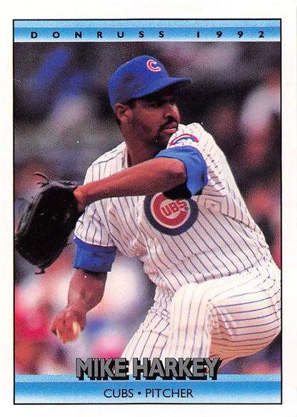 Mike Harkey Chicago Cubs baseball card showing pitcher in mid-throw with pinstriped uniform