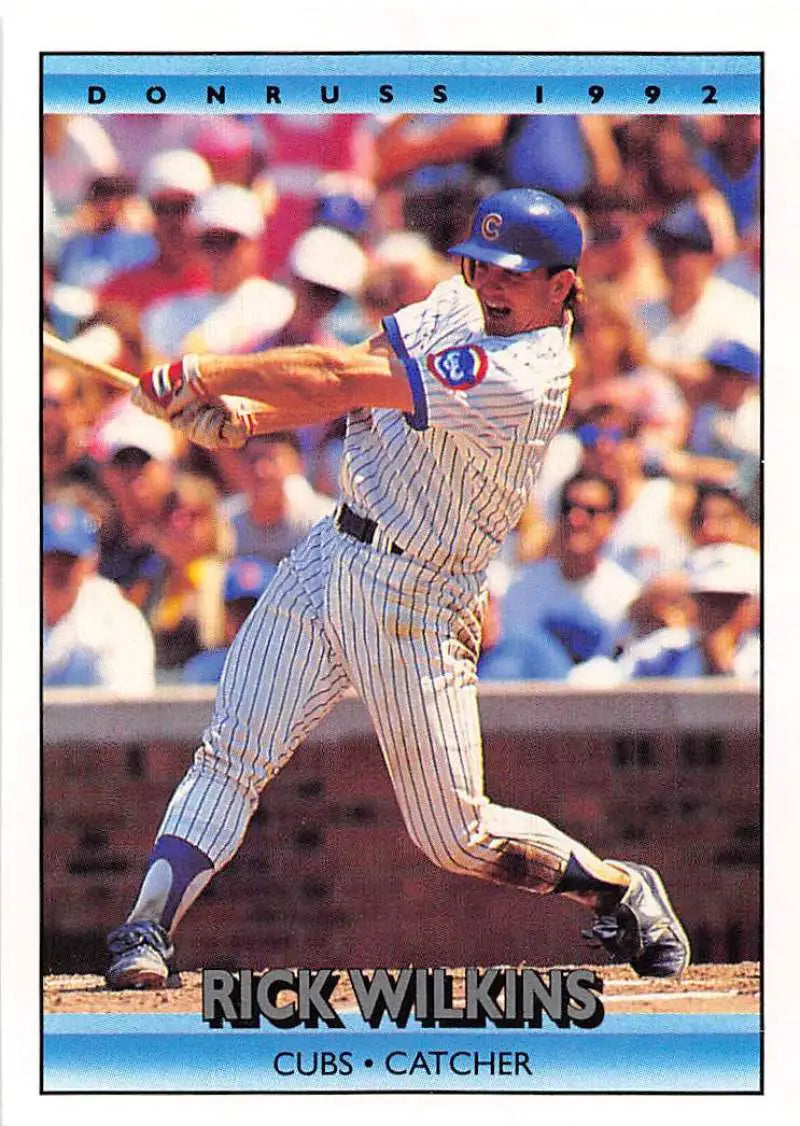 1992 Donruss Rick Wilkins baseball card featuring Chicago Cubs catcher mid-swing