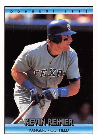 1992 Donruss Kevin Reimer baseball card featuring Texas Rangers outfielder at bat