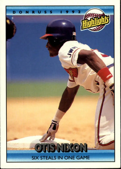 Otis Nixon leading off in a white uniform on 1992 Donruss Atlanta Braves Baseball Card