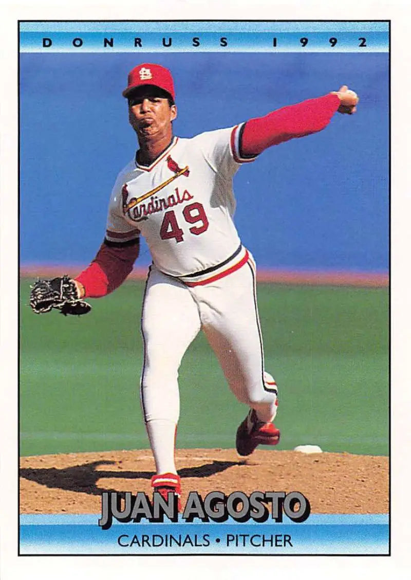 Juan Agosto pitching on the mound in a St. Louis Cardinals uniform for baseball card