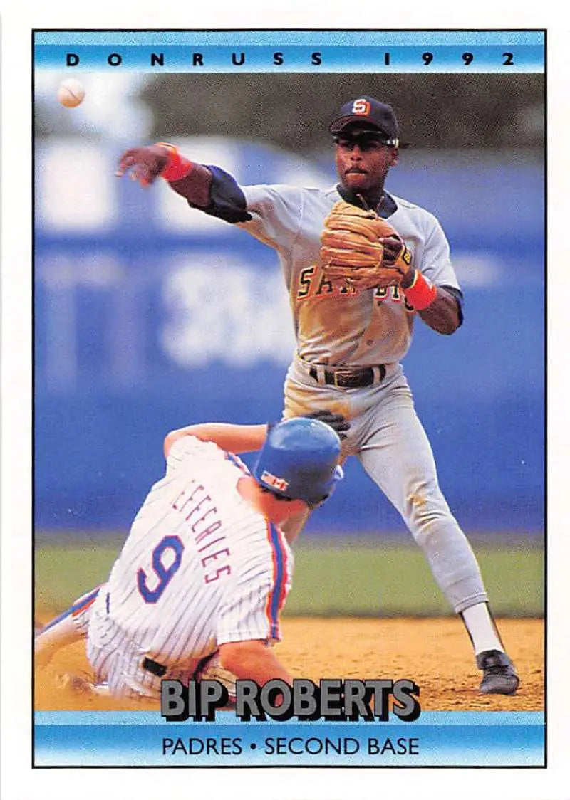 Baseball card featuring Bip Roberts in a double play at second base for San Diego Padres