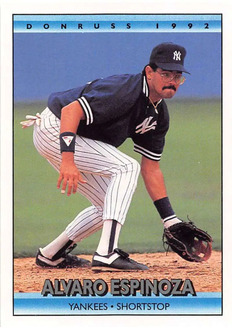 Alvaro Espinoza in New York Yankees uniform fielding, featured on a baseball card