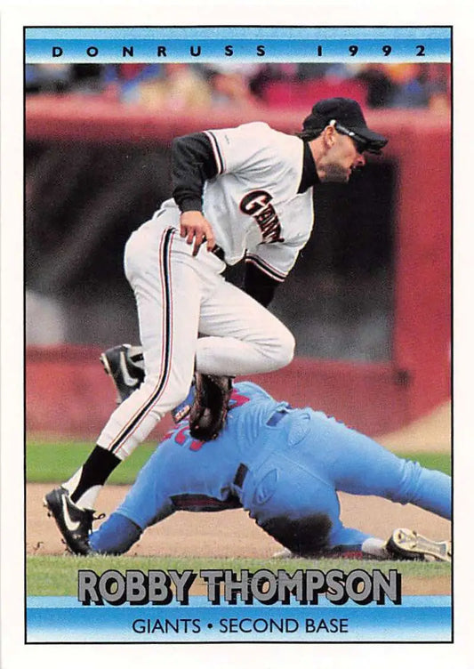 1992 Donruss #52 Robby Thompson making a play for the San Francisco Giants baseball card