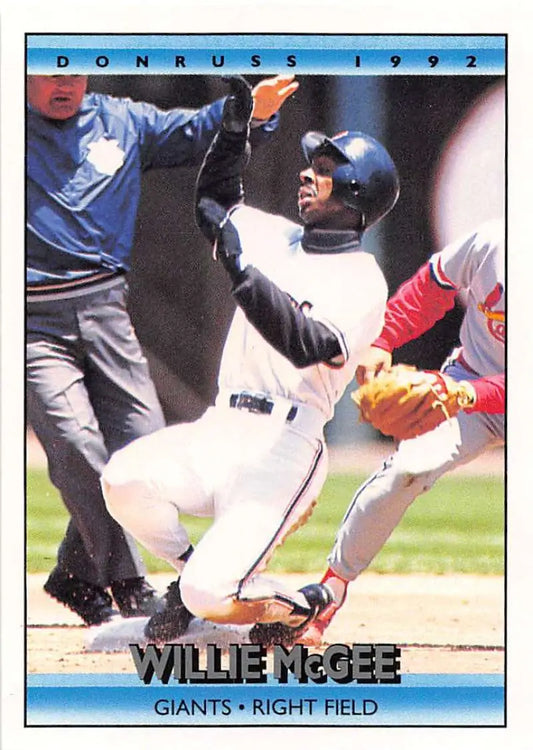 Baseball card of Willie McGee sliding into home plate for the San Francisco Giants